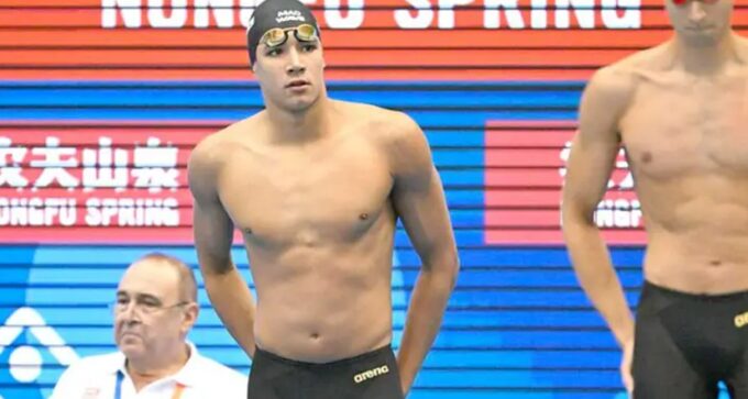 Ahmed Hafnaoui competing at World Swimming Championships