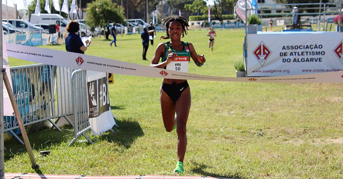 Image of Likina Amebaw and Thierry Ndikumwenayo Celebrating Their Victories in Albufeira