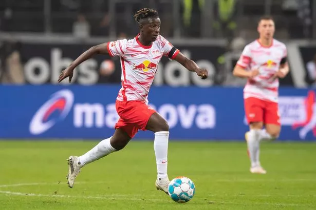 Amadou Haidara celebrates his goal against Fribourg in the Bundesliga