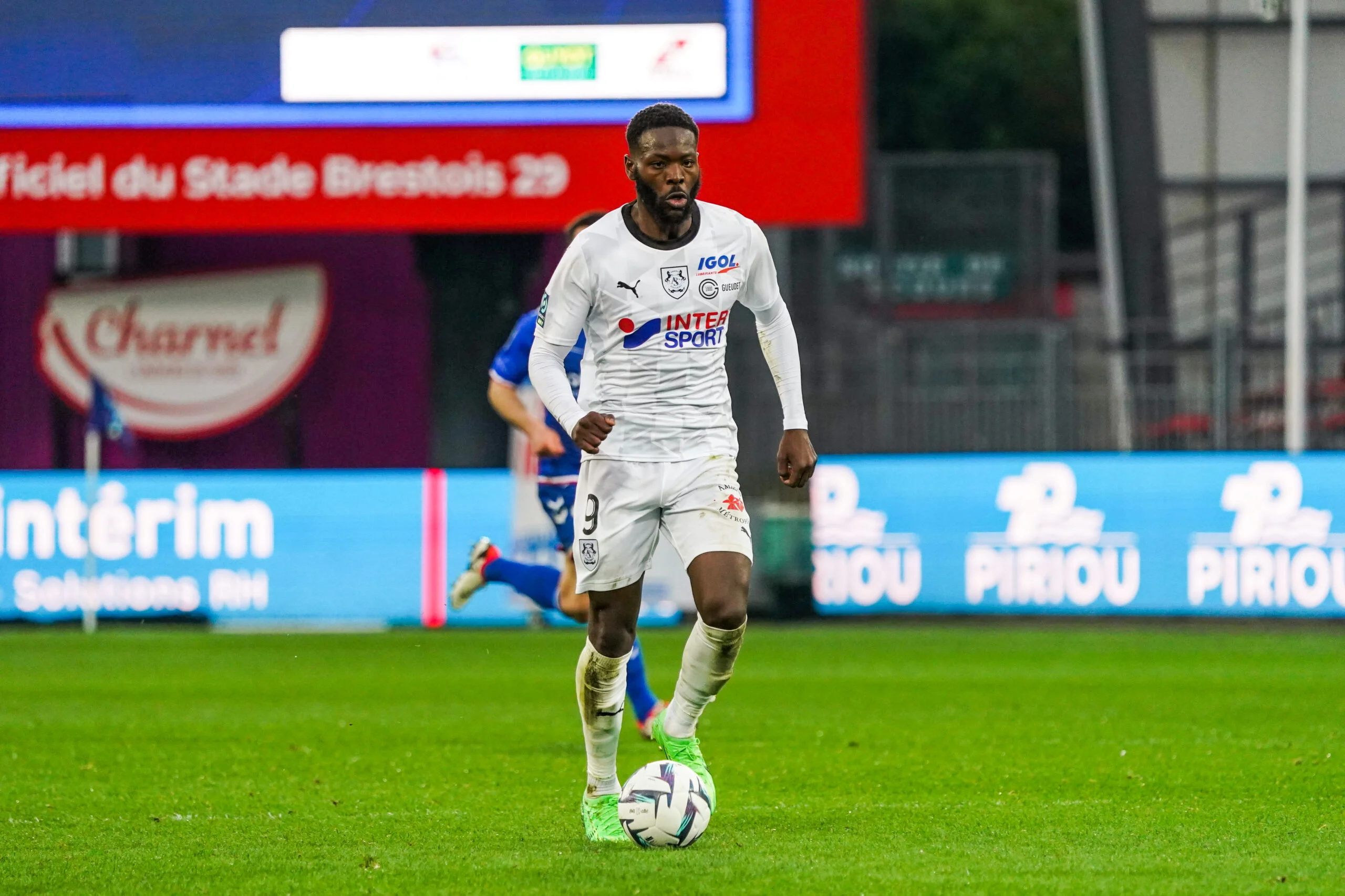 Louis Mafouta scoring a goal for Amiens in the Ligue 2 clash against Quevilly