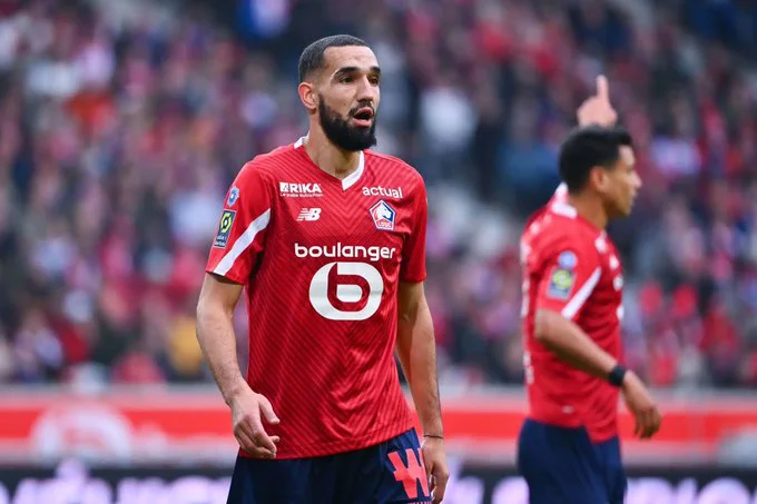 Nabil Bentaleb celebrates a goal with Lille