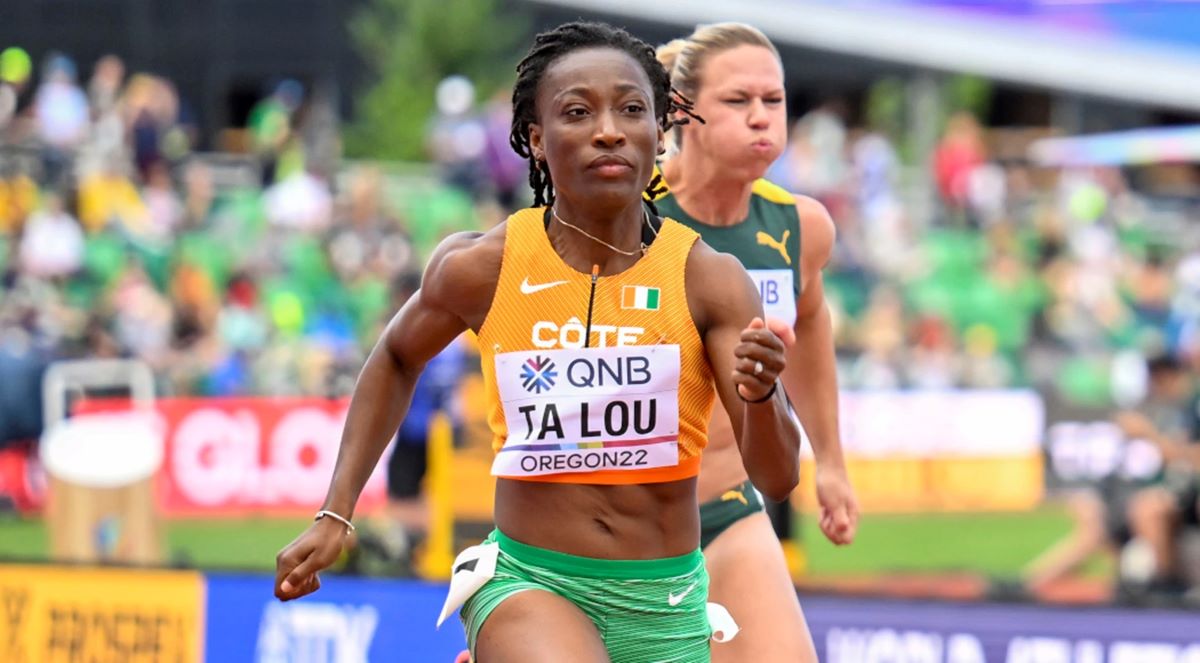 Marie-Josée Ta Lou-Smith sprintant lors de la course de qualification du 100m